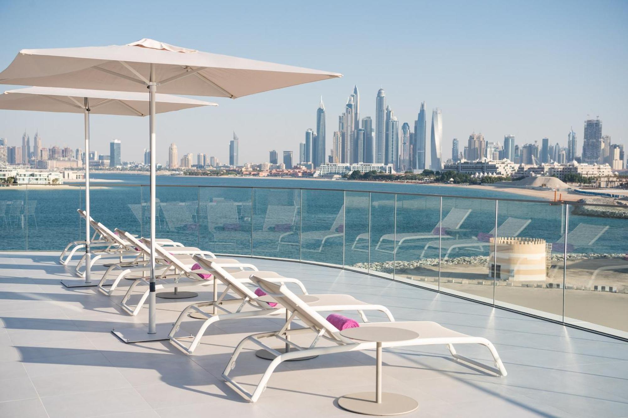 迪拜棕榈w酒店 外观 照片 View of Dubai Marina skyline from the rooftop pool